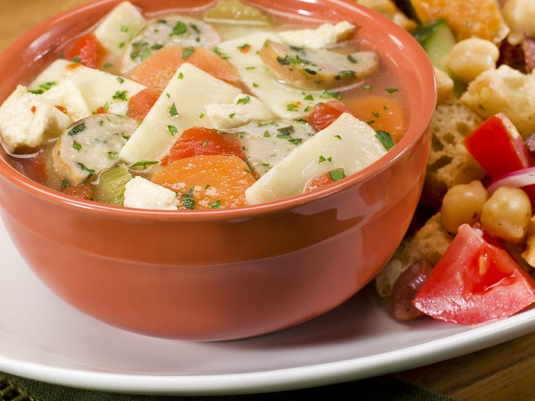 Chicken sausage soup in a bowl