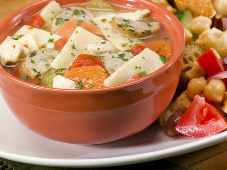 Chicken sausage soup in a bowl